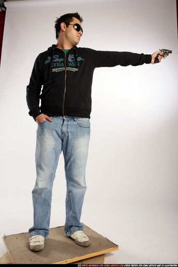 Man Adult Average Black Fighting with gun Standing poses Sportswear