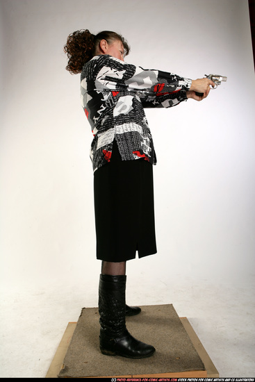 Woman Old Average White Fighting with gun Standing poses Casual