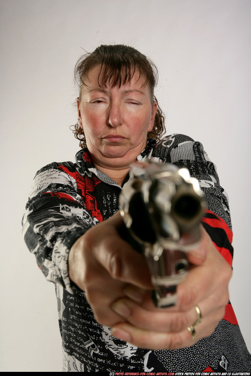 Woman Old Average White Fighting with gun Standing poses Casual