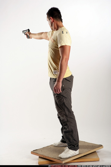 Man Adult Athletic White Fighting with gun Standing poses Sportswear