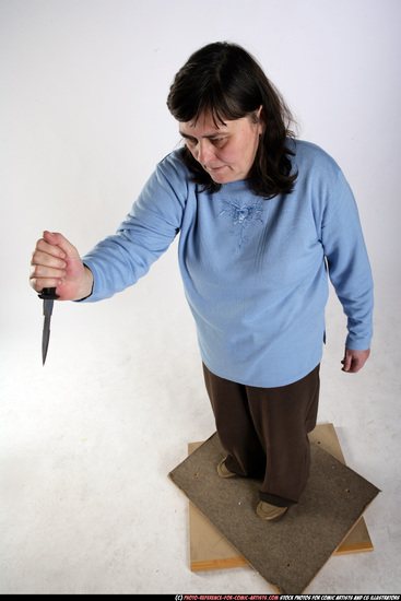 Woman Old Chubby White Fighting with knife Standing poses Casual