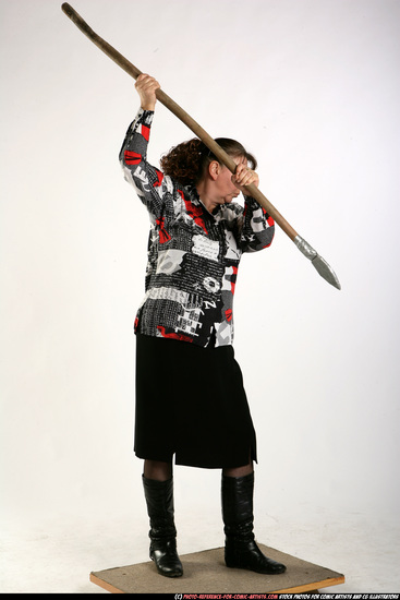 Woman Old Average White Fighting with spear Standing poses Casual