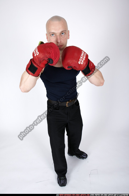 Premium Photo | Strength and power. full length of young african man in red  boxing gloves fighting while standing against grey background