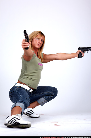 Woman Adult Muscular White Fighting with gun Kneeling poses Sportswear