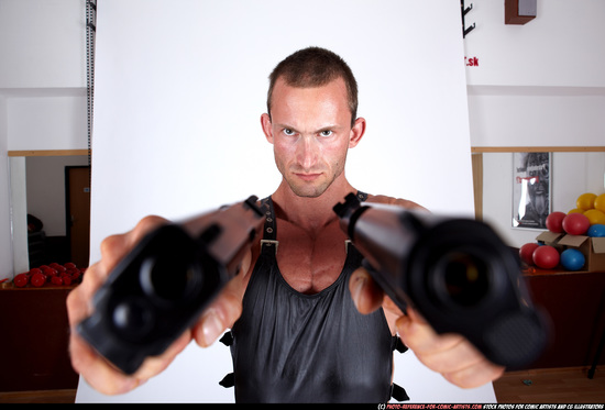 Man Adult Muscular White Fighting with gun Standing poses Casual