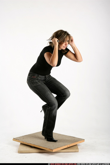 Woman Adult Athletic White Fighting with knife Standing poses Casual