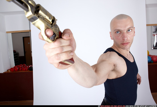 Man Adult Muscular White Fighting with gun Standing poses Sportswear