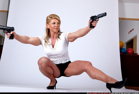 Woman Adult Muscular White Fighting with gun Kneeling poses Sportswear