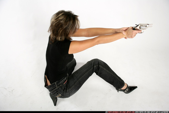 Woman Adult Athletic White Fighting with gun Kneeling poses Casual