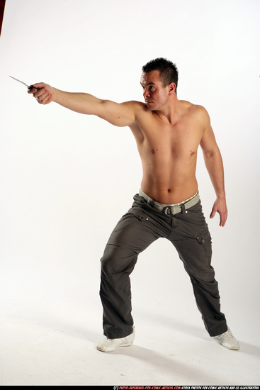 Man Adult Athletic White Fighting with knife Standing poses Pants