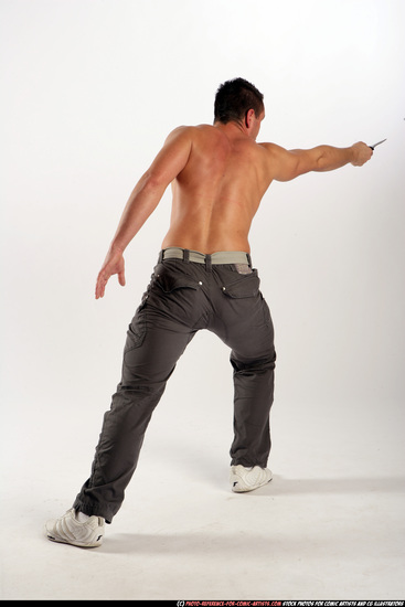 Man Adult Athletic White Fighting with knife Standing poses Pants