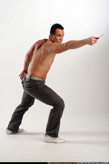 Man Adult Athletic White Fighting with knife Standing poses Pants