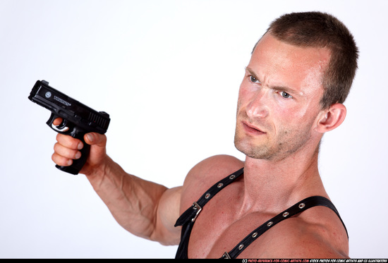 Man Adult Muscular White Fighting with gun Standing poses Casual