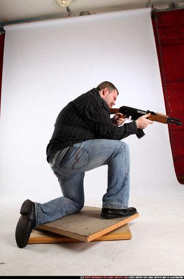 Man Adult Chubby White Fighting with submachine gun Kneeling poses Casual