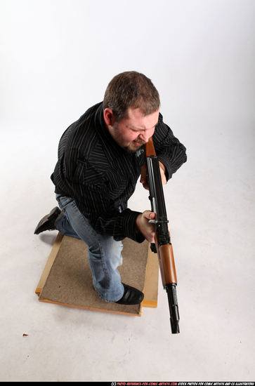 Man Adult Chubby White Fighting with submachine gun Kneeling poses Casual