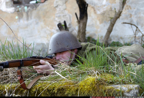 Man Adult Average White Fighting with rifle Laying poses Army