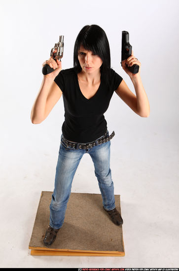 Woman Adult Athletic White Fighting with gun Standing poses Sportswear