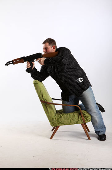 Man Adult Chubby White Fighting with submachine gun Kneeling poses Casual