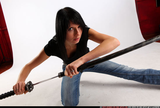 Woman Adult Athletic White Fighting with sword Kneeling poses Sportswear