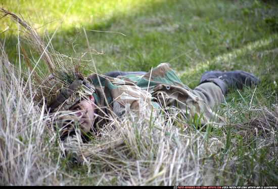 Man Adult Average White Fighting with rifle Laying poses Army