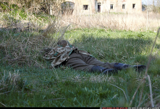 Man Adult Average White Fighting with rifle Laying poses Army