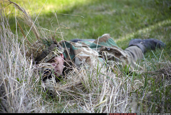 Man Adult Average White Fighting with rifle Laying poses Army