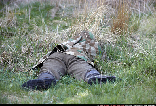 Man Adult Average White Fighting with rifle Laying poses Army