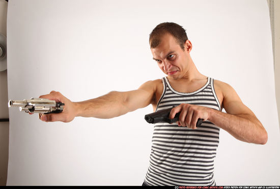 Man Adult Athletic White Fighting with gun Standing poses Casual