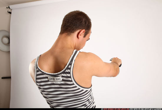 Man Adult Athletic White Fighting with gun Standing poses Casual