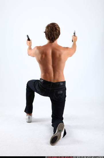 Man Young Athletic White Fighting with gun Kneeling poses Pants