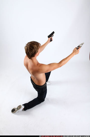 Man Young Athletic White Fighting with gun Kneeling poses Pants