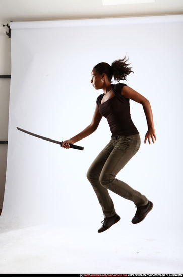 Woman Young Athletic Black Fighting with sword Moving poses Casual