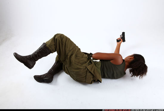 Woman Young Athletic Black Fighting with gun Laying poses Army