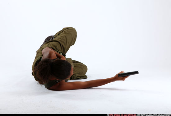 Woman Young Athletic Black Fighting with gun Laying poses Army