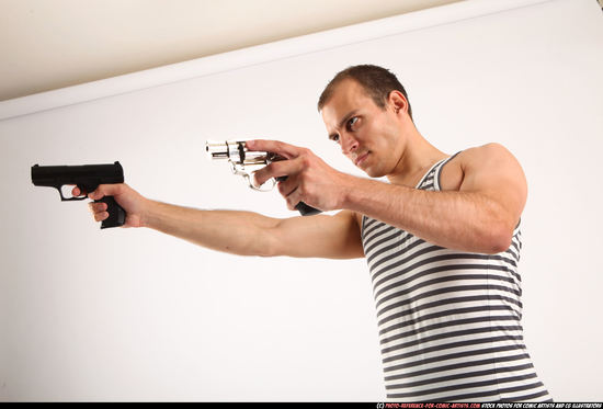 Man Young Athletic White Fighting with gun Standing poses Casual