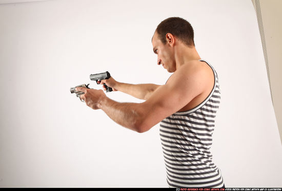 Man Young Athletic White Fighting with gun Standing poses Casual