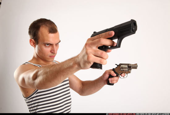 Man Young Athletic White Fighting with gun Standing poses Casual