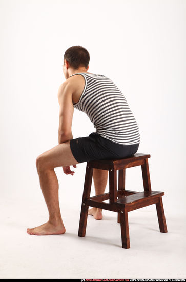 Man Adult Athletic White Neutral Sitting poses Sportswear