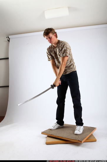 Man Young Athletic White Fighting with sword Standing poses Casual