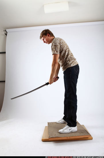 Man Young Athletic White Fighting with sword Standing poses Casual