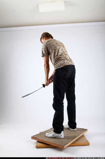 Man Young Athletic White Fighting with sword Standing poses Casual