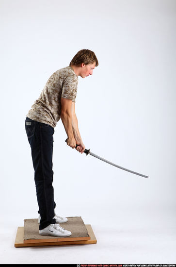 Man Young Athletic White Fighting with sword Standing poses Casual