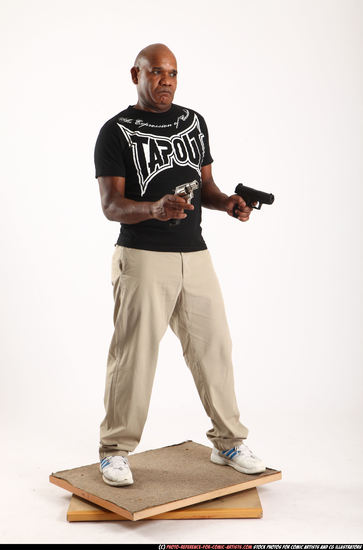 Man Old Chubby Black Fighting with gun Standing poses Casual