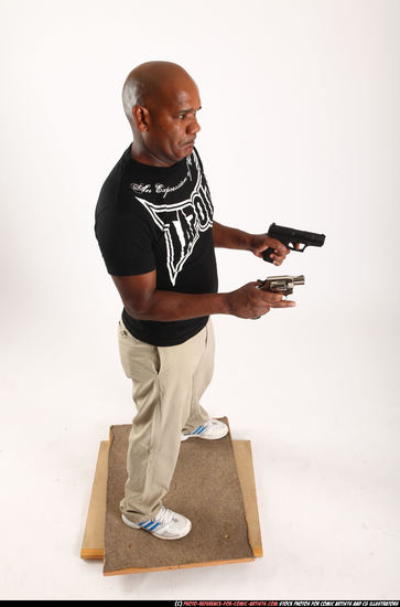 Man Old Chubby Black Fighting with gun Standing poses Casual