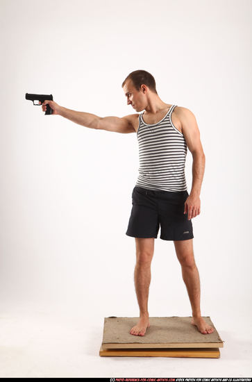 Man Adult Athletic White Fighting with gun Standing poses Sportswear