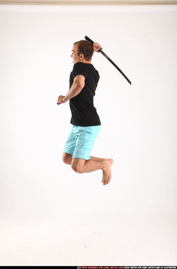 Man Adult Athletic White Fighting with sword Moving poses Sportswear