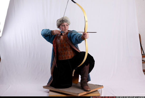 Woman Adult Average White Fighting with bow Kneeling poses Army