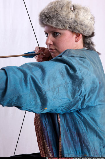 Woman Adult Average White Fighting with bow Kneeling poses Army