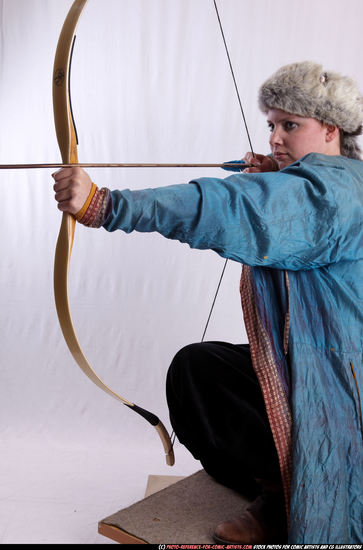 Woman Adult Average White Fighting with bow Kneeling poses Army