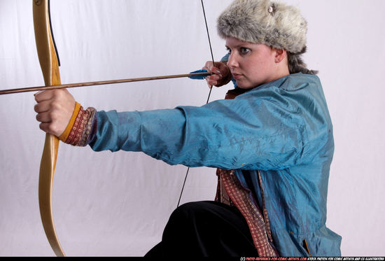 Woman Adult Average White Fighting with bow Kneeling poses Army